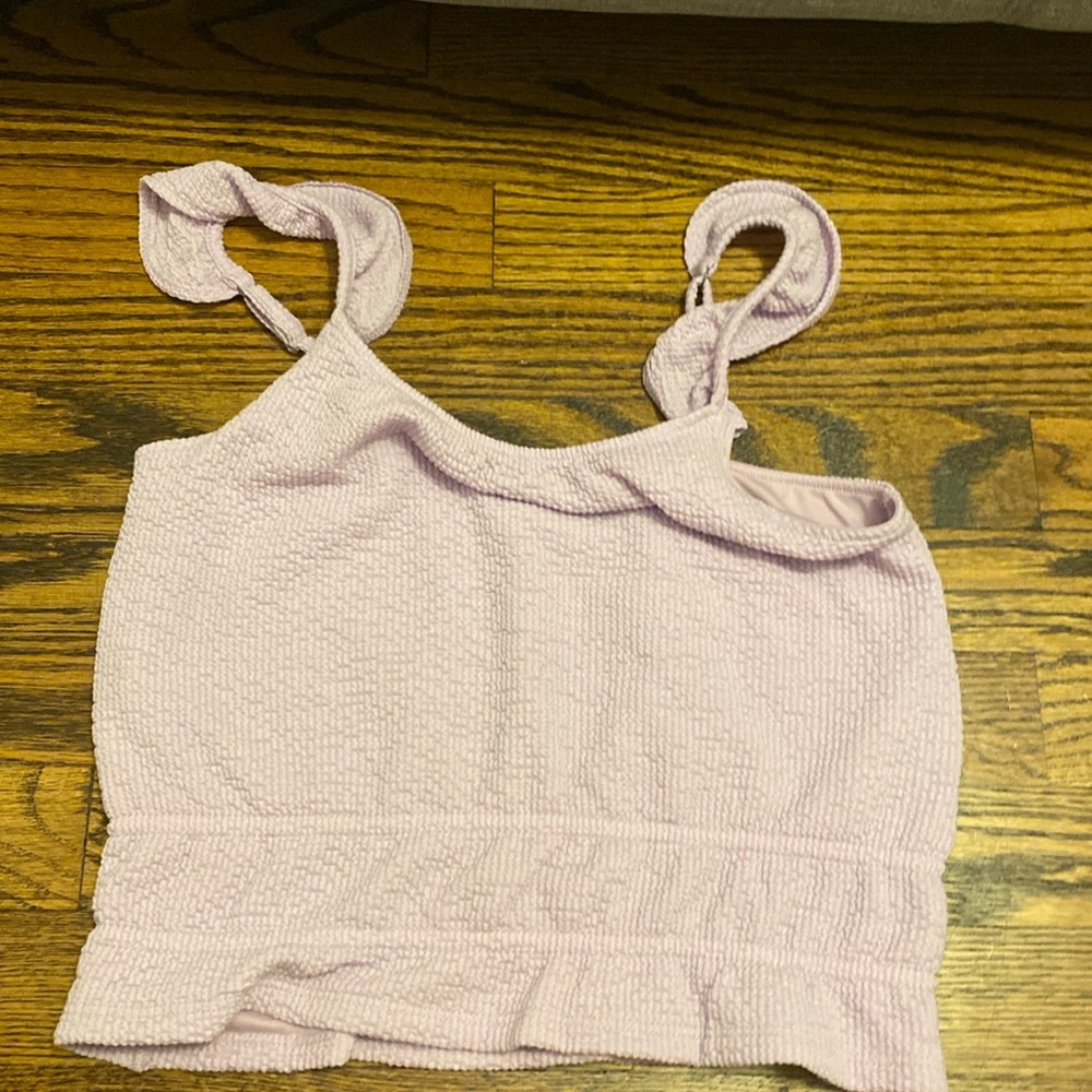 A purple crop top tank top